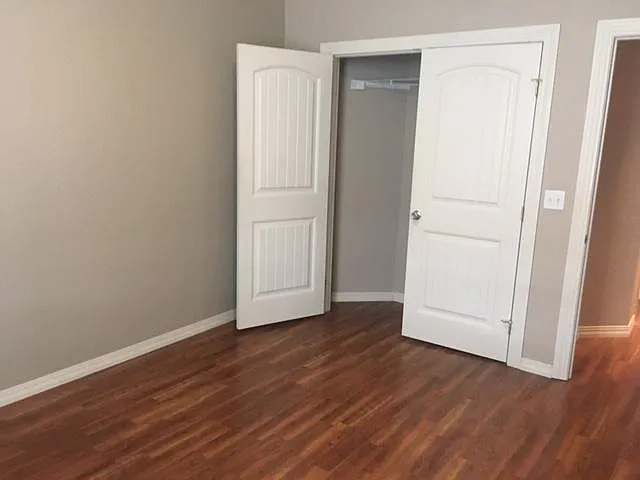 Bedroom and closet - 100 E Broadway St #B-F