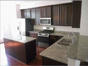 Kitchen w/ granite and all new applicances