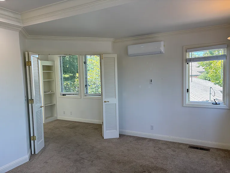 Primary bedroom with view to office nook