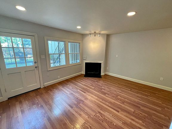 Living room facing south! great light all throughout the day. fireplace =)