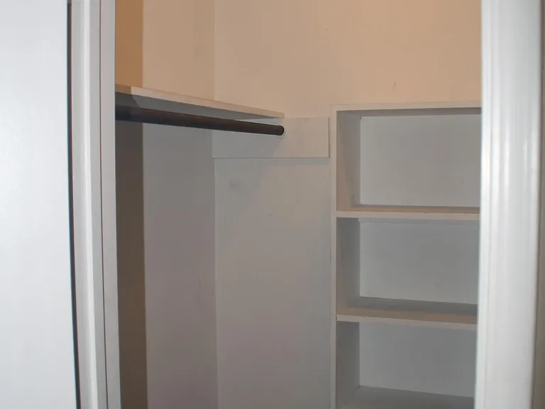 Walk-in closet in second bedroom