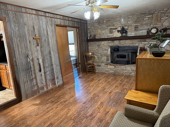 Second living room with fireplace.