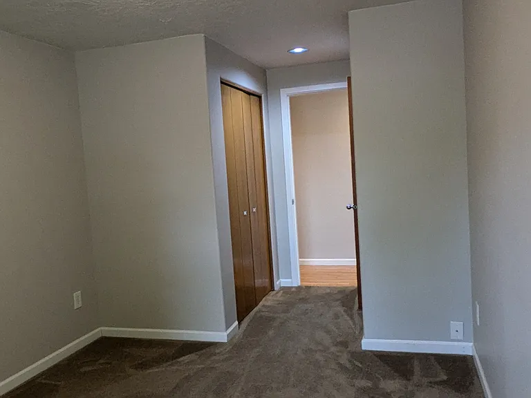 Front bedroom 9' by 12' - Entry and closet