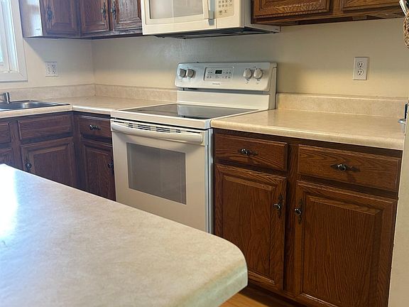 Kitchen space has a dishwasher as well