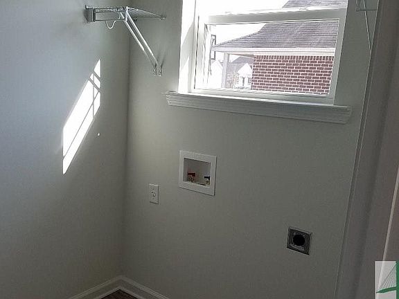 Laundry room with a window