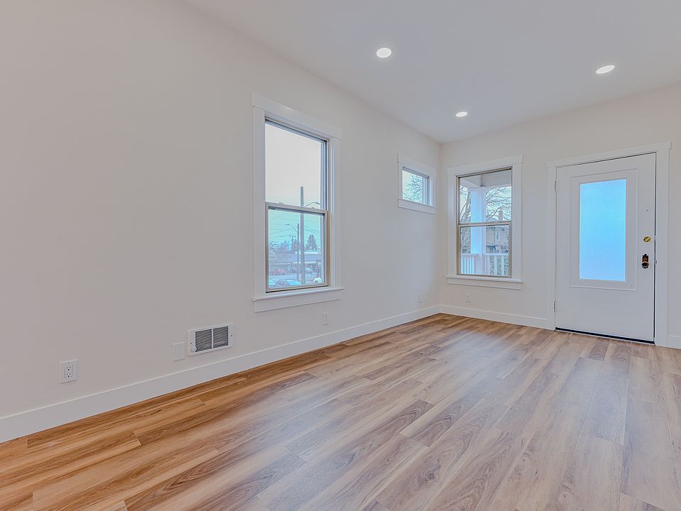 Spacious Living Area with 10 Foot Ceilings and Lots of Windows