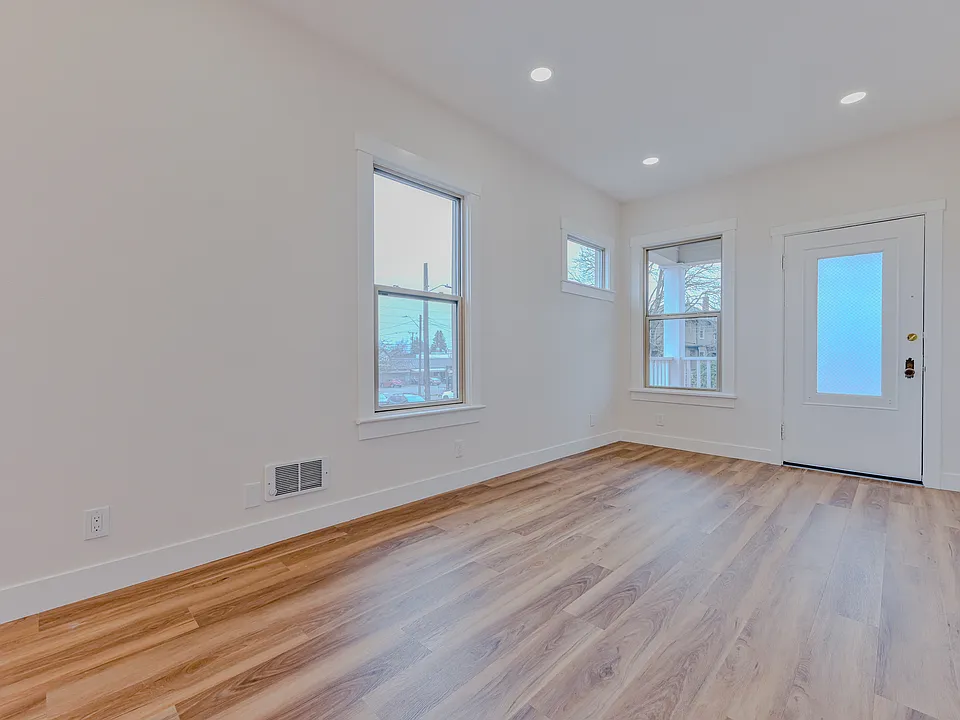 Spacious Living Area with 10 Foot Ceilings and Lots of Windows