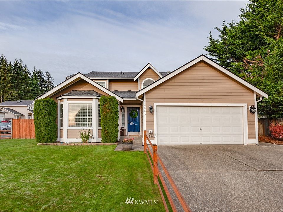 The home is nicely set back on a corner lot in a cul-de-sac street.  The yard is fully fenced-both front and back yards.  All concrete is aggregate, and the roof is a brand-new 30 year composition roof.  The porch is covered, and there's RV parking on the side of the home.