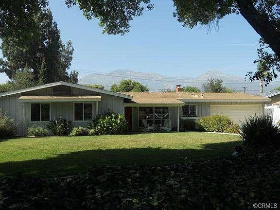 Excellent curb appeal on tree-line cul-de-sac