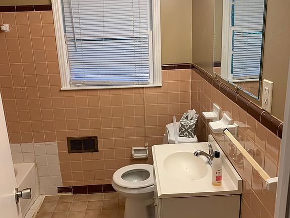 Full bathroom with tile