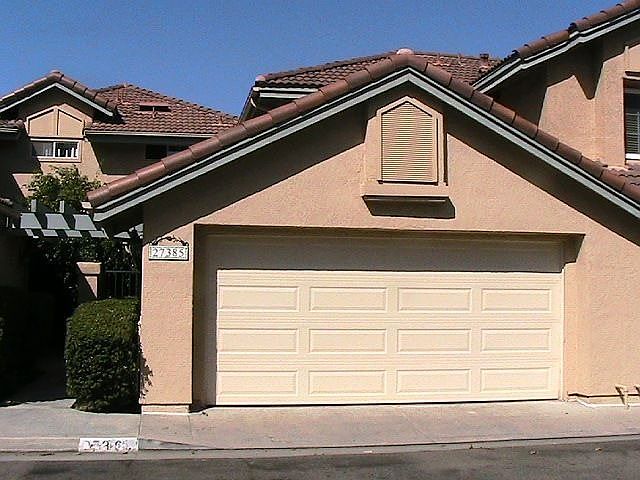 Front with brand new garage door