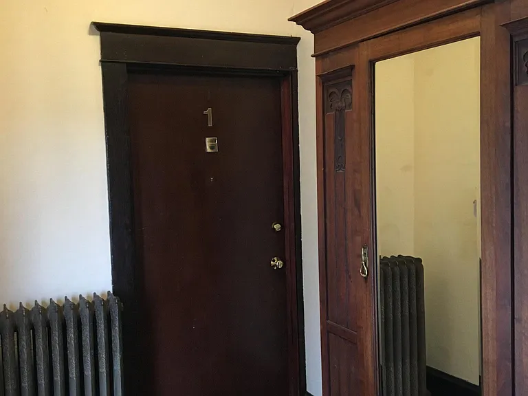 Entryway to apartment. Locked foyer shared by Units 1, 3, a