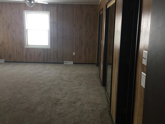 Master bedroom on the northeast corner of the home