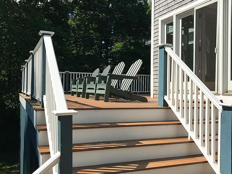 Large ocean-facing deck that wraps all the way around to the back and detached Studio. There is also an outdoor hot-cold shower at the bottom of the stairs.