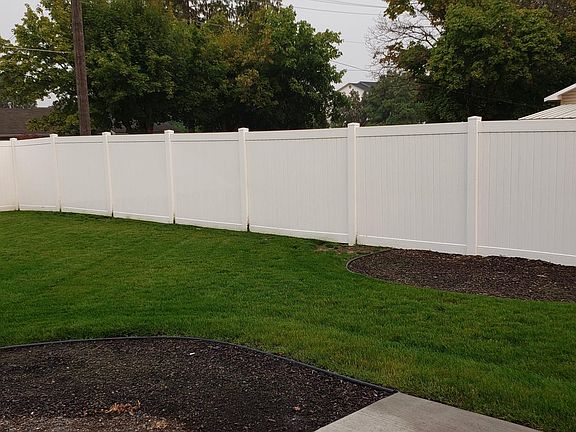 Concrete patio outside patio slider.