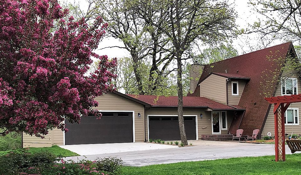 1 1/2 story and 6 car garage