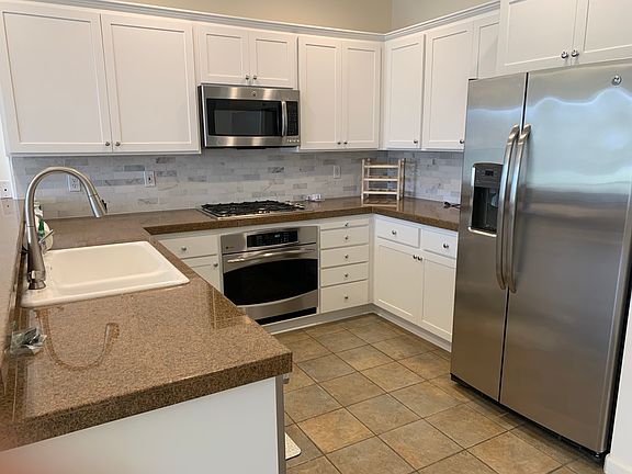 Kitchen with stainless steel appliances