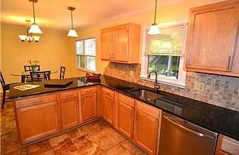 New Kitchen Cabinets, Granite, and Tile Backsplash