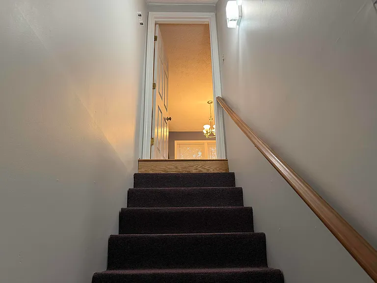 staircase to first floor, kitchen