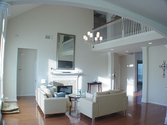 View of den and fireplace