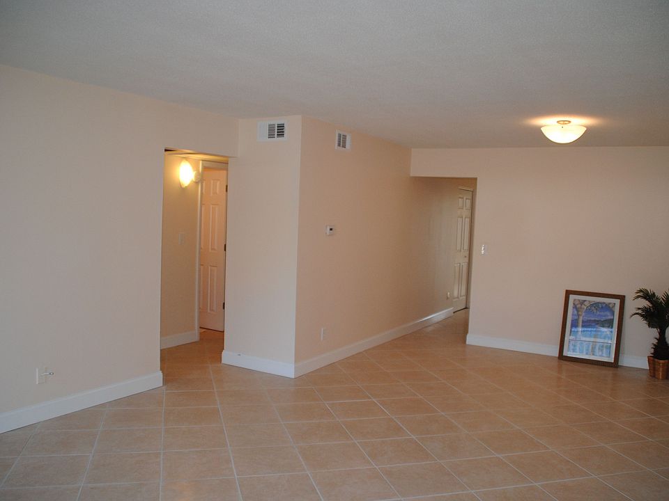 Dining area overlooking living area. 