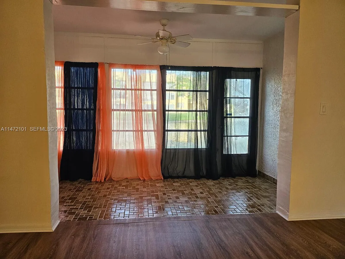 Building Photo - 5940 NW 64th Ave #106