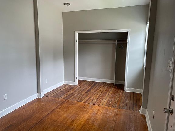 Extra large bedroom with wall to wall closet/storage space.