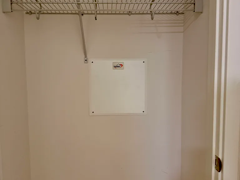 Hall closet for more storage.
