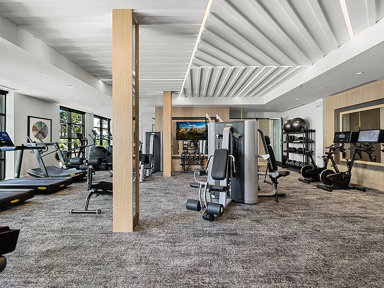 Expansive fitness center with weights and state-of-the-art gear