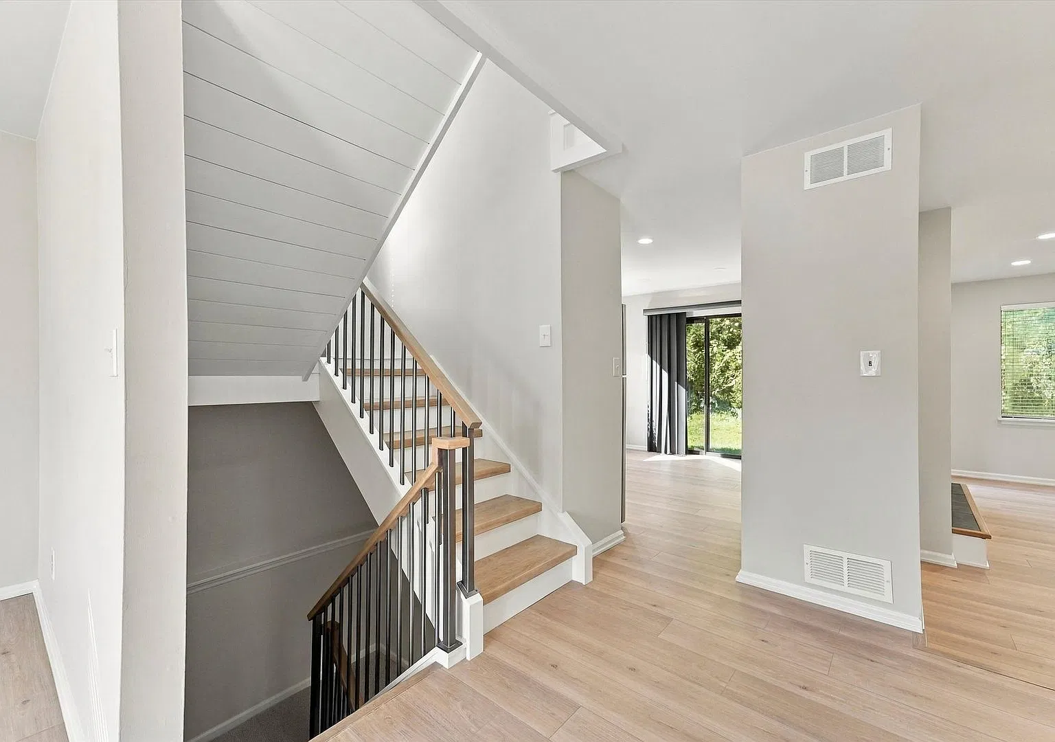 Beautifully Renovated End-Unit Townhome with Finished Basement, Deck & Garage | 300 Winding Way — Photo 3