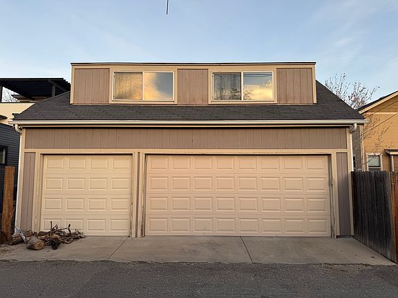 Oversized three car alley garage