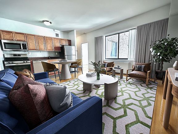 3rd image of 121 E 12th St APT 6F