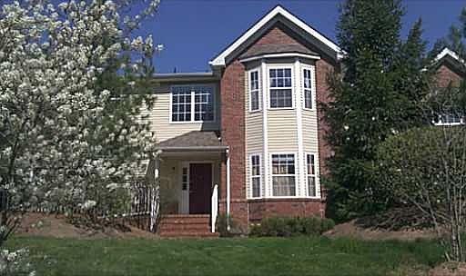 Exterior front, nice private wooded area