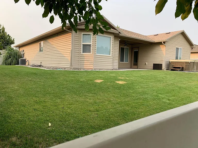 House sits high to see view over fence. Side yard and entry gate.
Hot-tub hook-up available; (pictured hot-tub is NOT included)