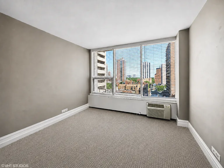 Second bedroom. Rendering of new carpet. Digitally renovated.