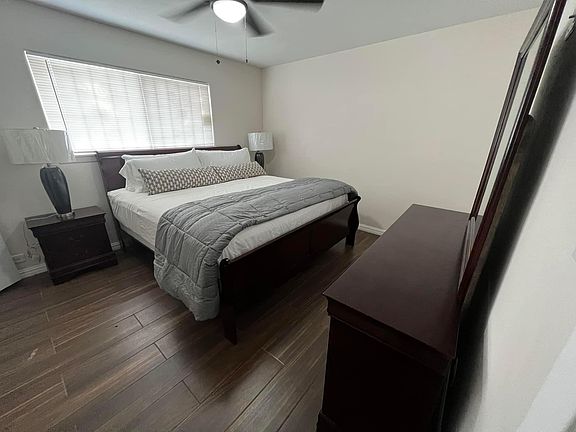 Spacious bedroom with king bed and 2 walk-in closets