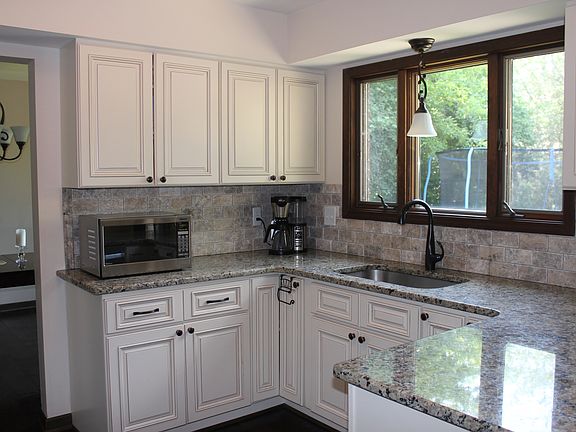 Kitchen, overlooks backyard
