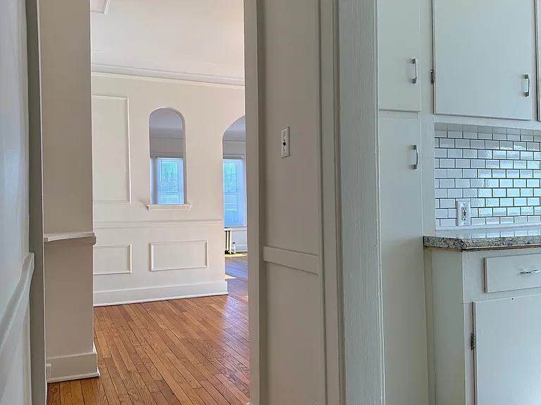 Hallway looking towards dining room and kitchen.