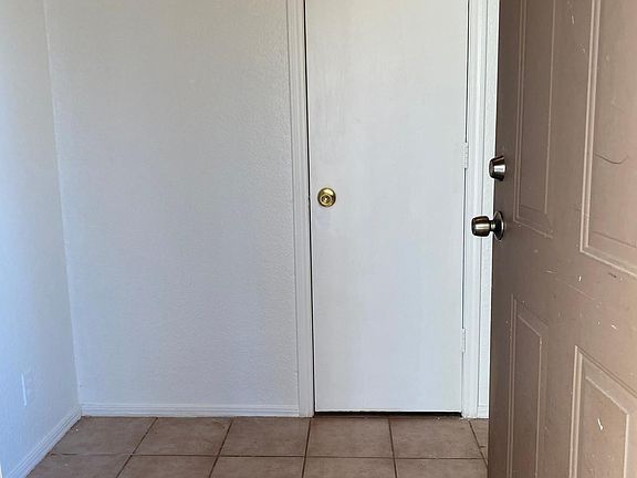 Front Tiled Entry with Coat Closet