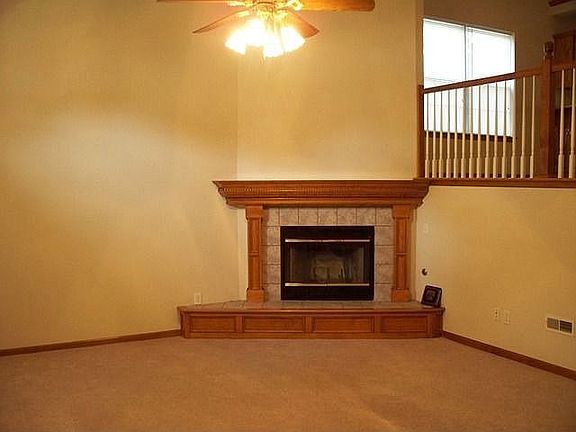 View of fireplace from front entry