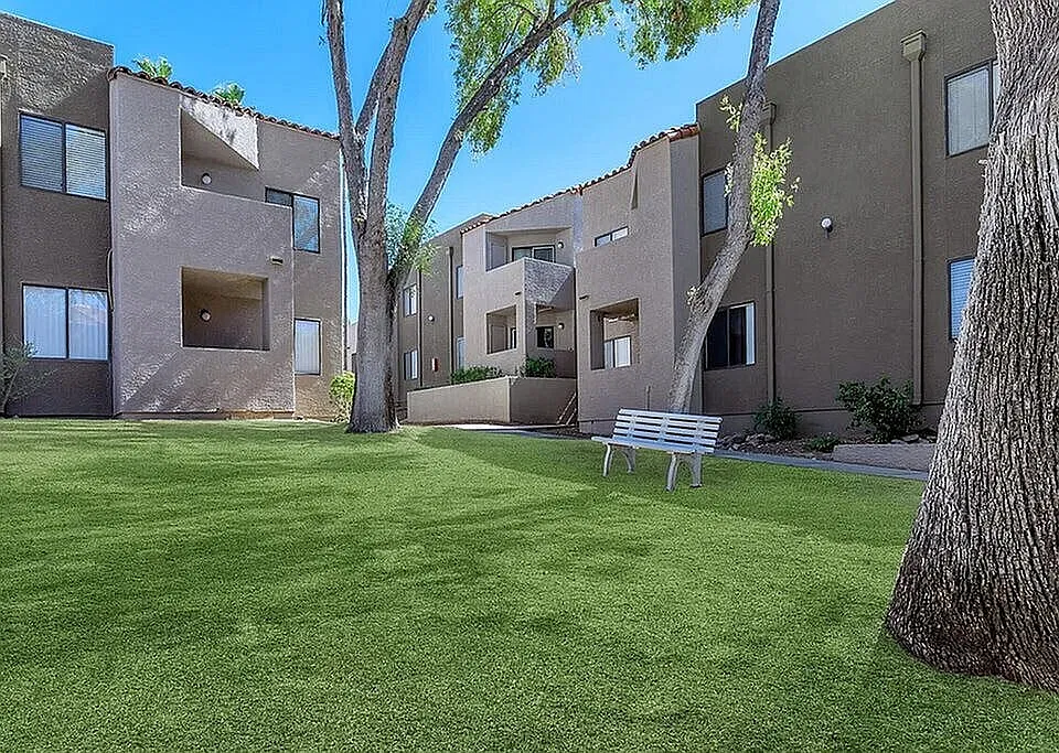 Building with lush green courtyard