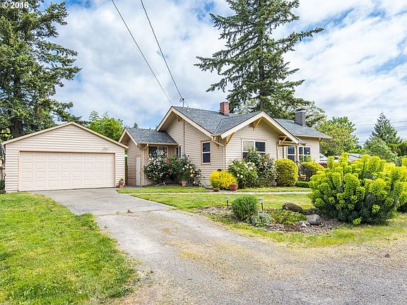 Detached double garage and driveway
