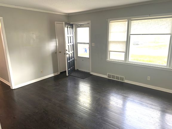 2nd view of Living room to front entry