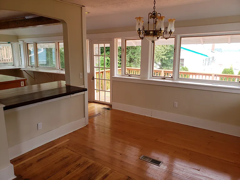 Antique French Chandelier in your water view dining area!
