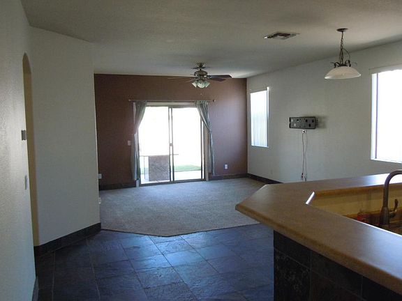 Entering from the living room to the kitchen and family room