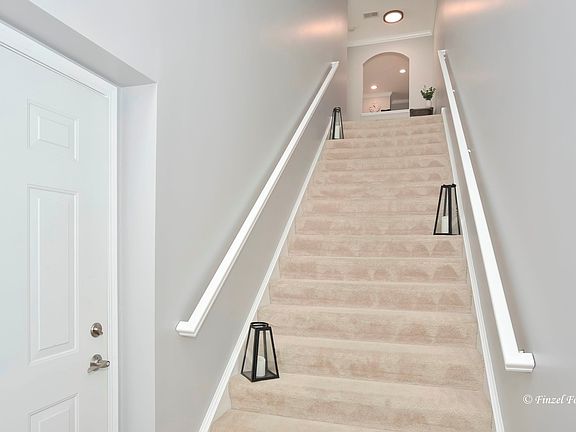 Enter on Ground Level, Garage Entrance on Left and Up to the Beautiful Penthouse