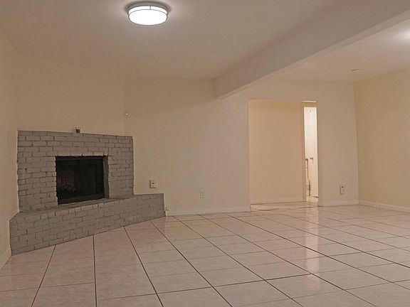 Huge Living Room/ Dining Room with Fireplace. Dimensions: 20' x 23'