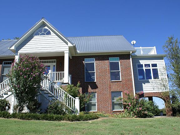 Lower level & entry to the Right is the Apartment. My gue