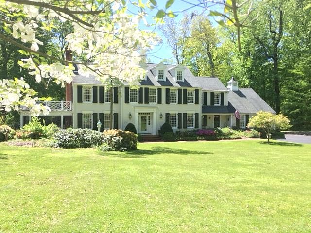 Classic center hall colonial in park like setting; 2 min. drive/12 min. walk to Talmadge Hill Metro North station