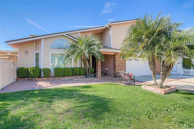 Welcome to 2156 West 238th Street in Torrance!  This beautifully maintained home is quietly nestled away from the street off of a long, private driveway.
